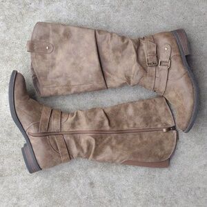 Brown harness right below the knee boots